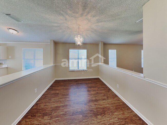 Building Photo - 1127 Hidden Cove Cir S