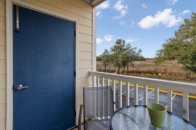 Building Photo - WATERFRONT LIVING! BEAUTIFULLY APPOINTED CONDO ON THE BAYOU IN OS SCHOOL DIST - FULLY FURNISHED