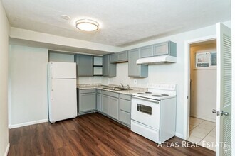 Building Photo - 2 Bed - Thoughtful Upgrades & affordable! ...