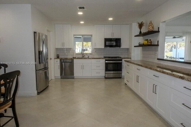 Building Photo - 9731 Bel Aire Dr