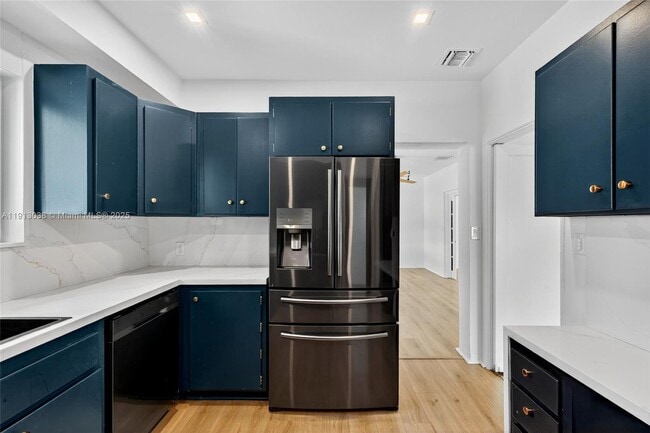 Building Photo - 465 NE 52nd St