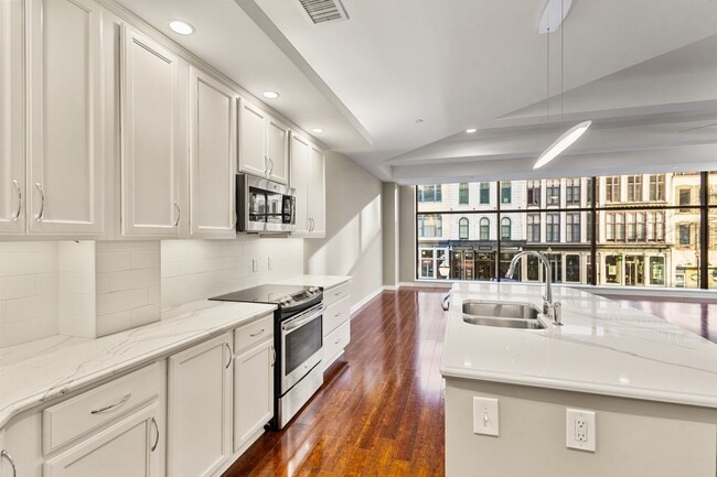 Building Photo - $1200 off a 12 month lease