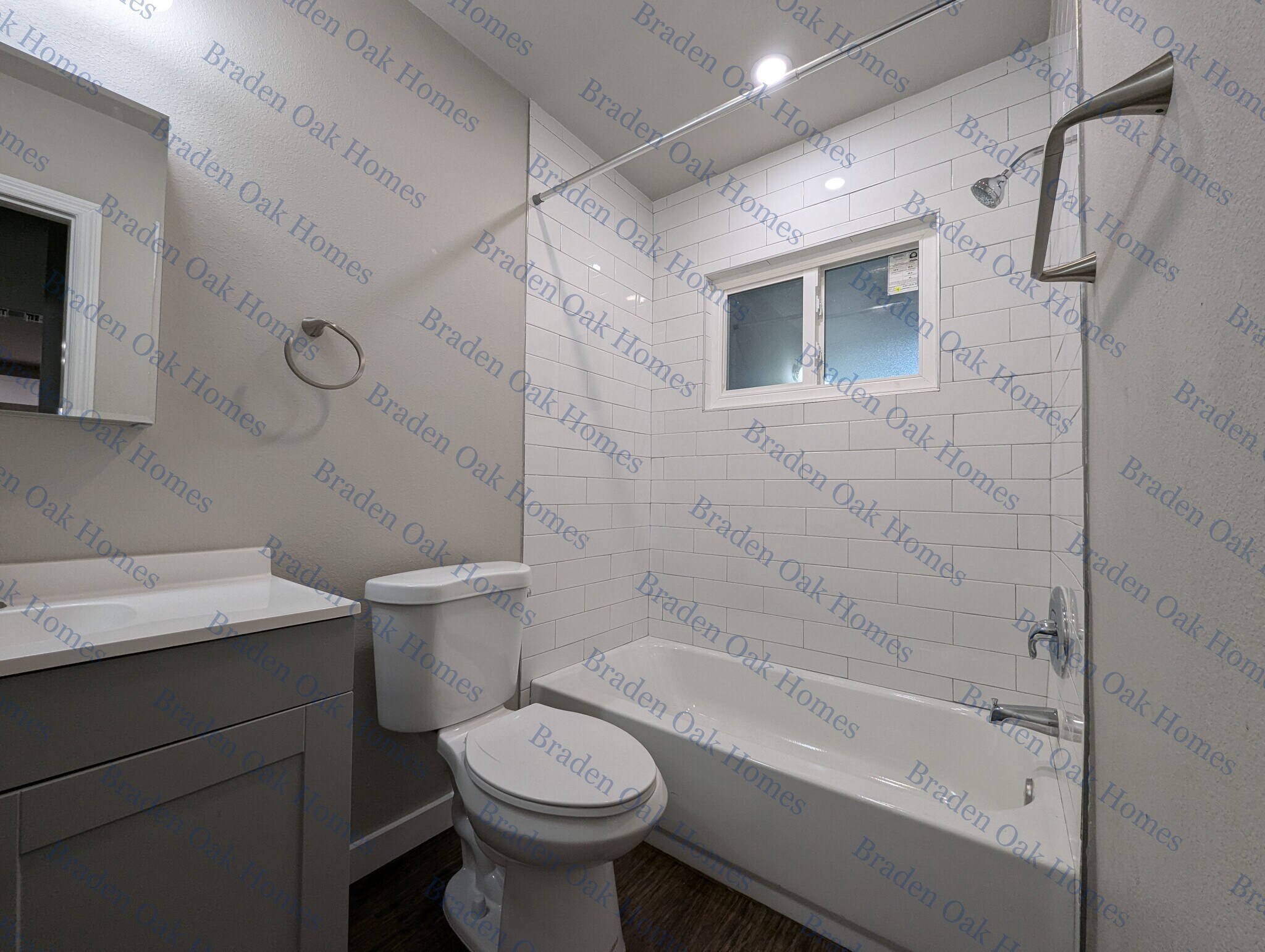 Modern bathroom with privacy glass window - 1814 26th St W