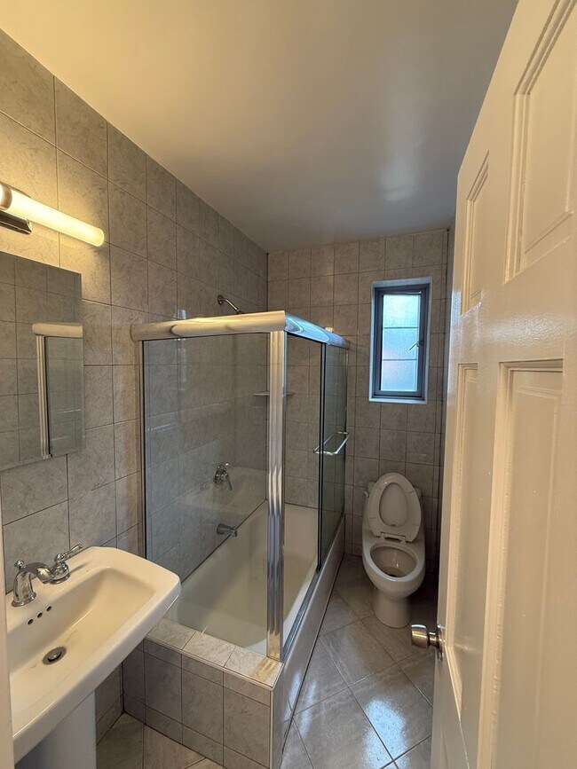 Building Photo - The Leslie — A Private Garden Enclave for ...