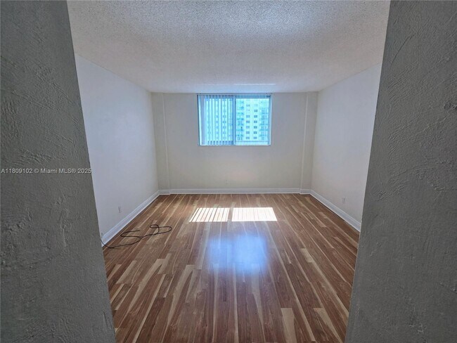 Building Photo - 19380 Collins Ave