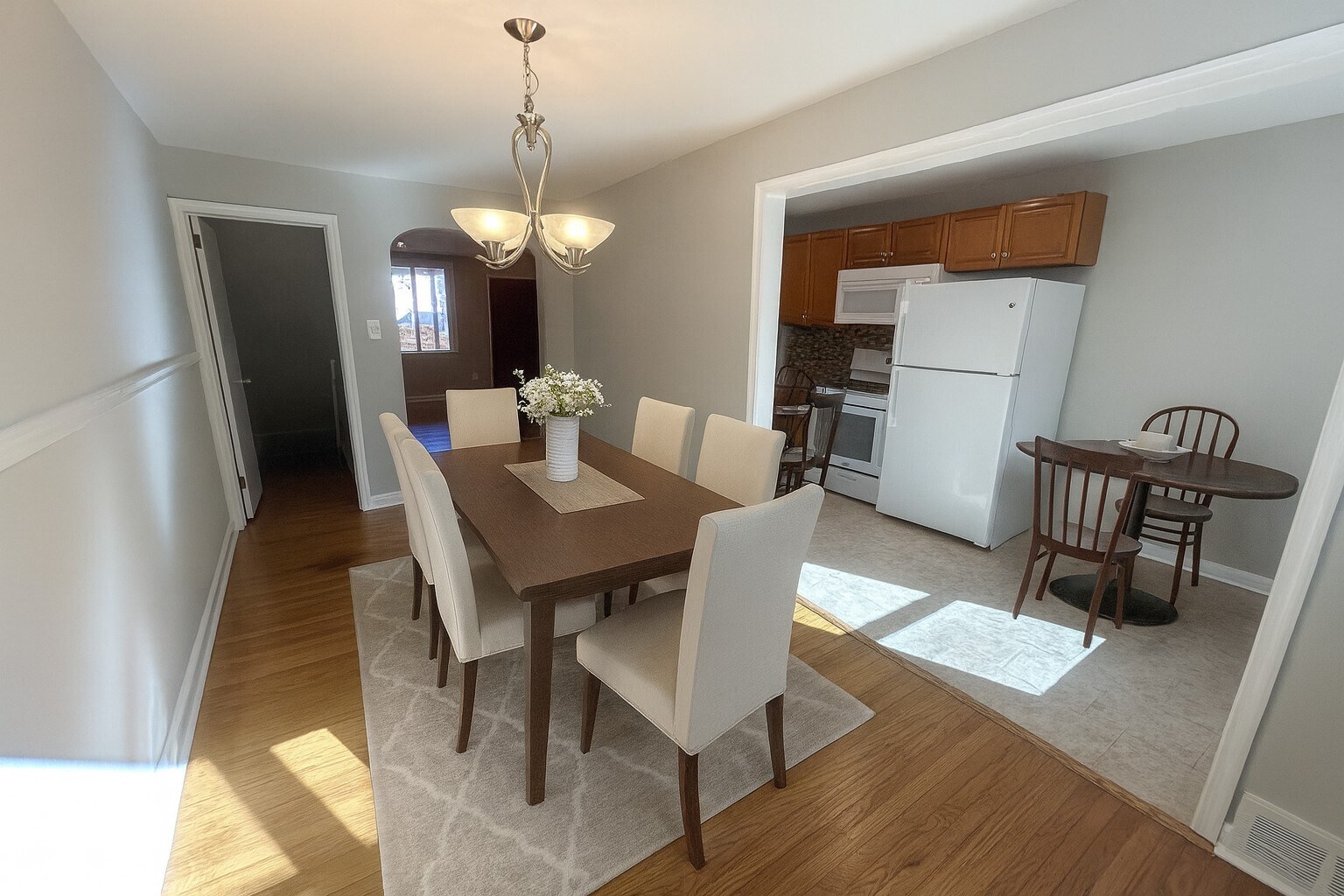 Virtually staged dining room/kitchen - 249 Park Dr