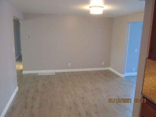 Building Photo - Remodeled !  Hardwood Flooring Throughout & New Carpet in Bedrooms, Tile, Granite, Large Living r...