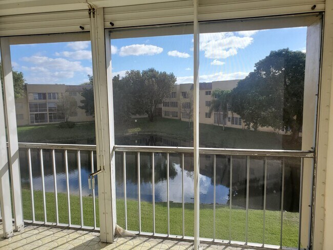 Building Photo - 6050 NW 64th Ave