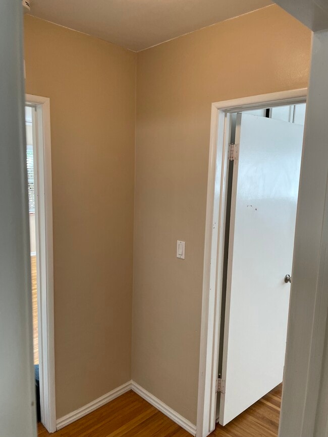 hall between bedrooms and bath - 1800 Green Ln