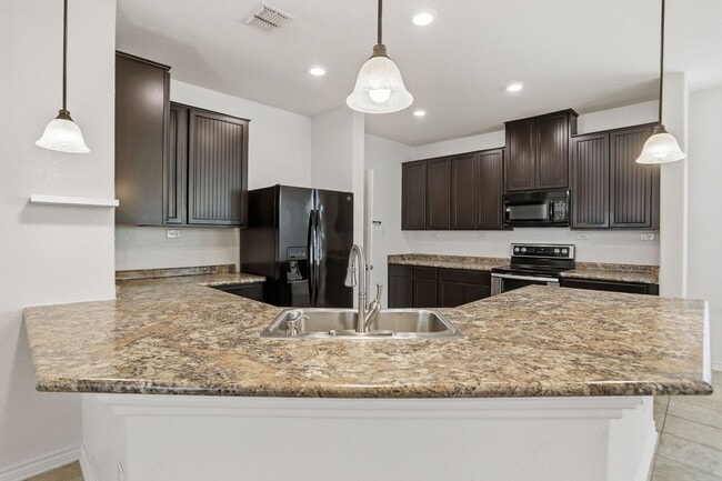 Building Photo - Single-Story Solar-Powered Home Near Braunig Lake – Comfortable & Convenient!