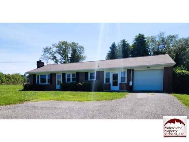 Primary Photo - Charming brick rancher offers a perfect bl...