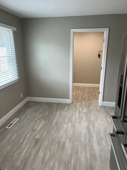 Kitchen into laundry - 4571 Moraine Ave