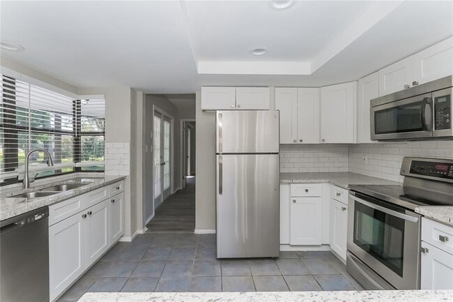 Building Photo - 8055 Wooden Dr