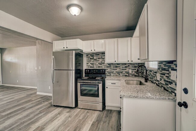 Building Photo - 3BR Home in Shawnee with Stainless Appliances, Fenced Yard & Storm Shelter!