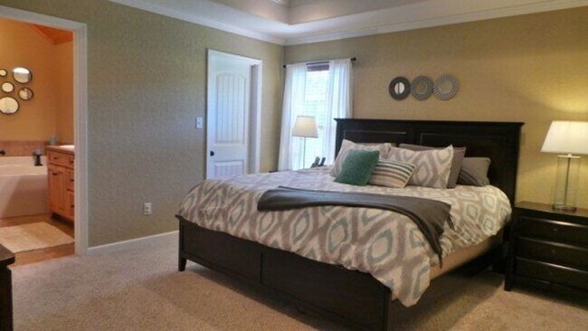 Building Photo - Modern Elegance Meets Spacious Comfort: 4B...