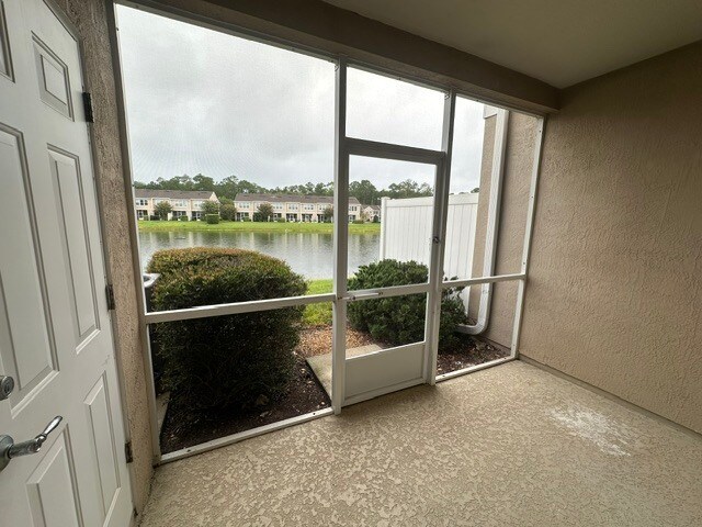 Building Photo - Stunning Townhome With Pond View In Gated Community