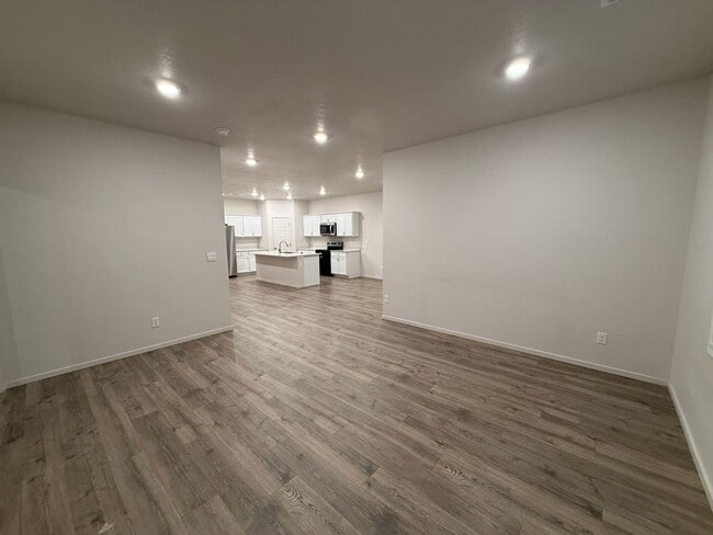 Building Photo - New Construction 4 Bed Mead School District Rancher w/ Fully-Fenced Yard and Attached Garage!