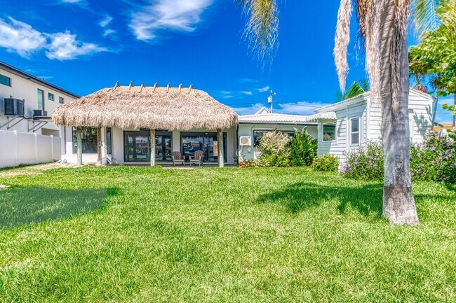 Building Photo - Treasure Island Three Bedroom, Two Bath Furnished Single Family Home on the water.