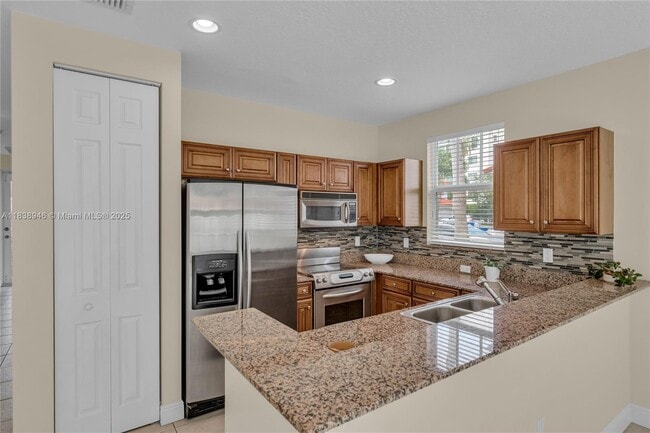 Building Photo - 4088 W Palm Aire Dr