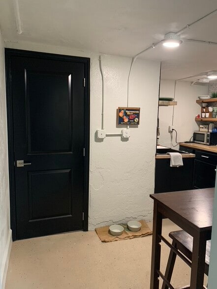 Bathroom door and entry to kitchen - 1415 W 1st St