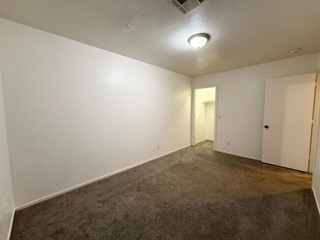 Building Photo - $500 OFF 1ST MONTHS RENT Updated 3-Bedroom Townhome in Gated Community with Pool Access