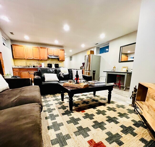 Spacious Living Room with 58 in Smart TV - 1525 N Maplewood Ave
