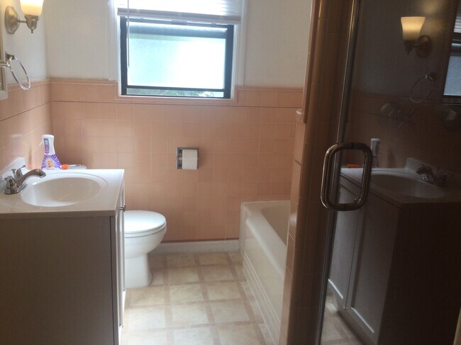Bathroom with separate tub and shower - 408 45th St