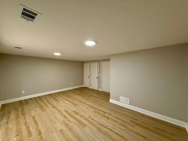 Building Photo - New Everything 4BR Townhome with Private Lower Level Suite | Stainless Kitchen | LVP + New Carpet...