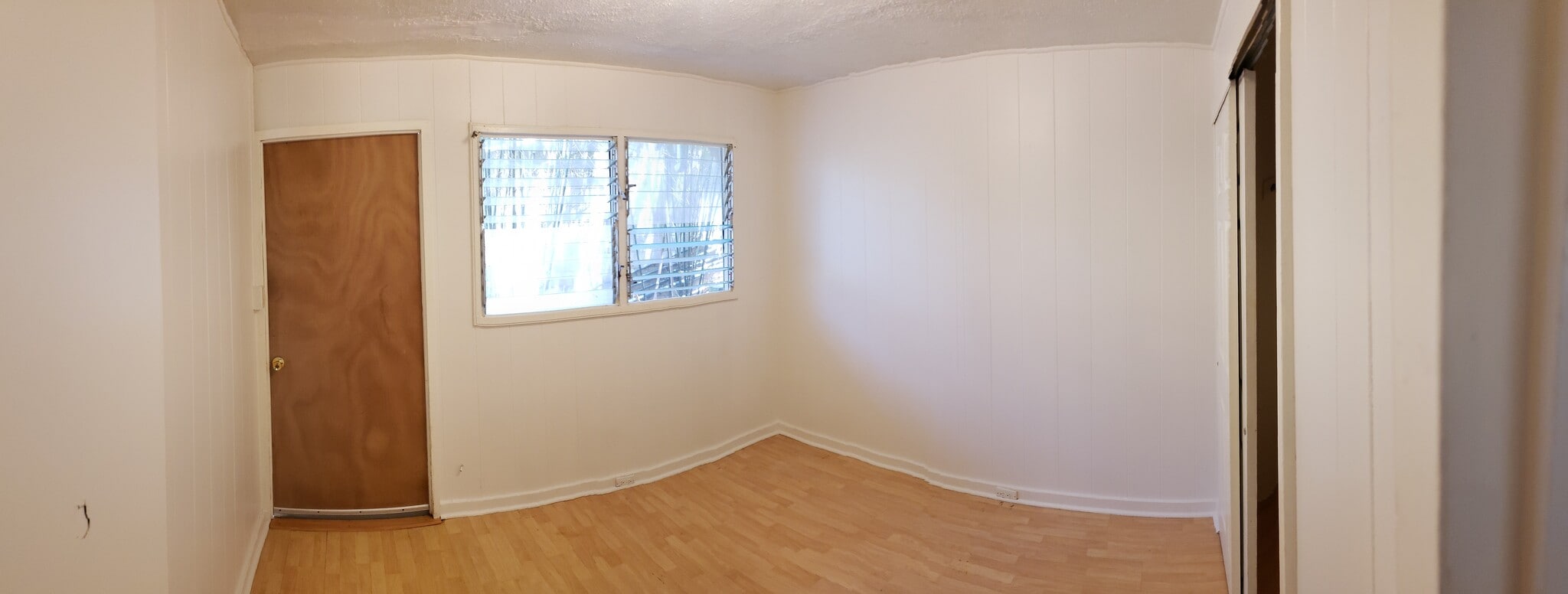Unit C-Bedroom #1. Bedroom has it's own closet. Doorway to balcony that connects with covered lanai. - 47 -411 Kamehameha Hwy