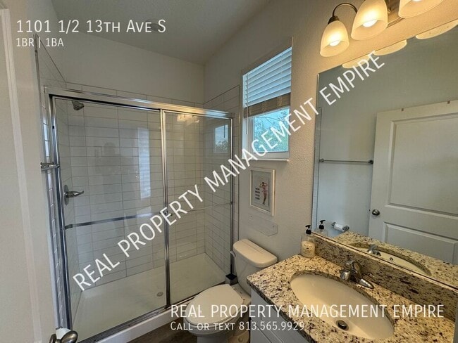 Building Photo - 1101 1/2 13th Ave S-