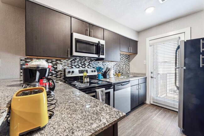 Building Photo - 2215 Town Lake Cir