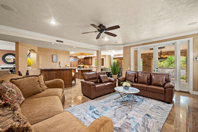 Building Photo - Elegant 5BR Furnished Estate with Pool & G...
