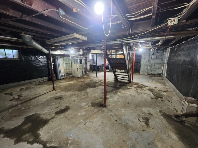 Building Photo - 4 BR home with first-floor living, new roof, and a private-feeling backyard in Lincoln Place