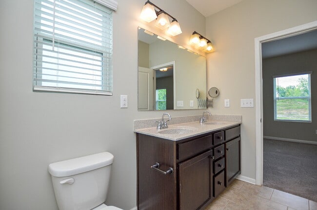 Building Photo - Spacious 4 Bedroom Home with 1st Floor Primary Suite in Austen Lakes  4 Bedrooms | 2.5 Bathrooms ...