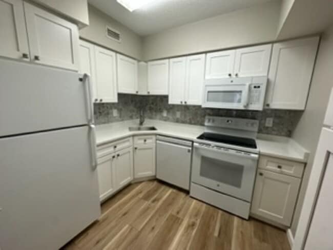 Building Photo - Live the Coastal Dream in This Stylishly U...