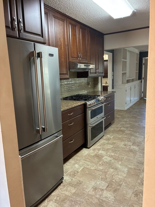 Building Photo - Chef's Kitchen! Large Home on Corner Lot with Spacious Fenced Yard