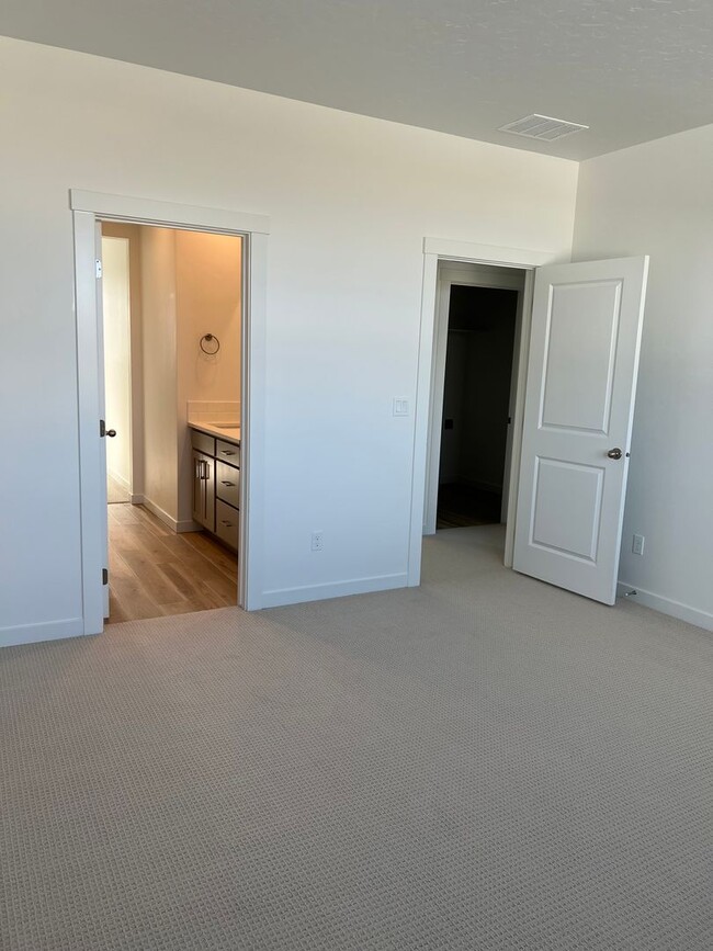 Building Photo - Introducing a brand new 4 bedroom, 3 bathr...