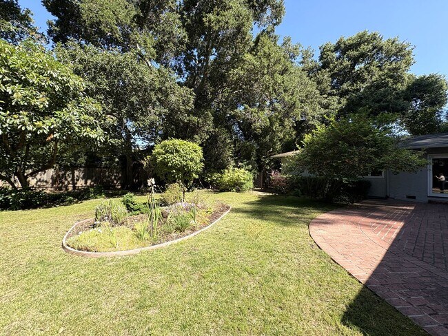 Building Photo - Beautiful Serene 4-Bedroom Home on a Gated...