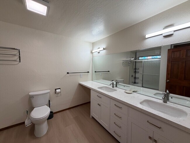 Building Photo - 2 Bed + Huge Bonus Room -  new flooring, paint and kitchen!   Lake Village Condo w/Forest Views