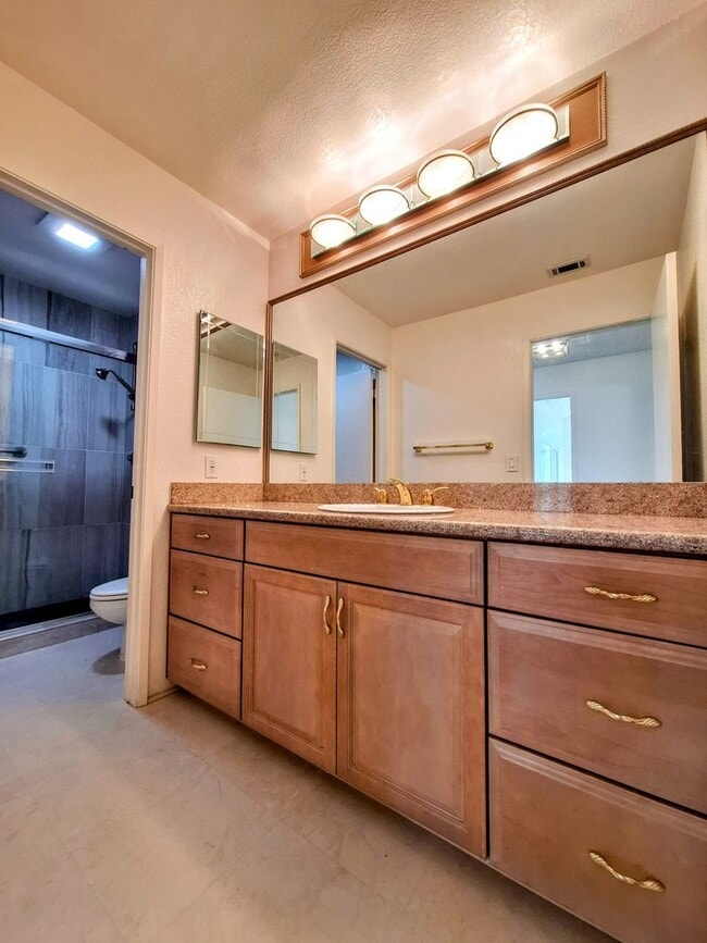 Building Photo - Spacious Two-Story 3bd Townhouse With Private Patios, Balcony, & Garage