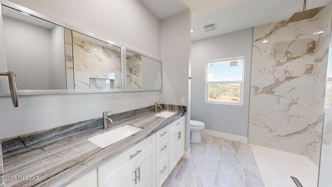Building Photo - 7095 W Los Reales Rd