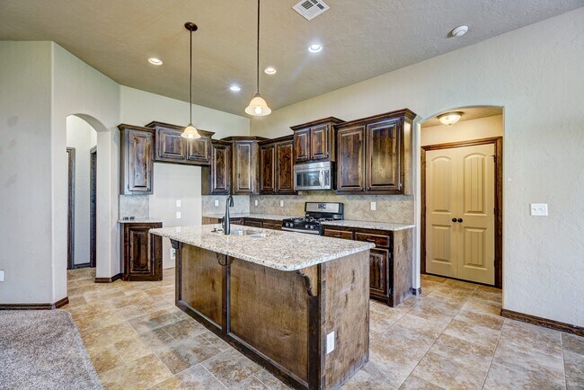 Building Photo - AVAILABLE THE END OF APRIL! 3 OR 4 BDRM, 2 BATHRM, 2 CAR & STORM SHELTER