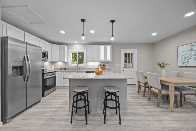 Building Photo - Charming 3-Bed Home with Granite Touches & Finished Basement in Raleigh!