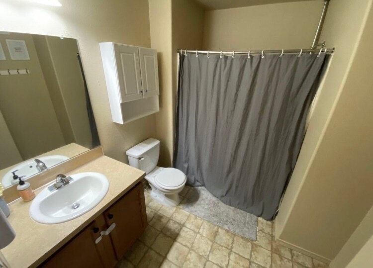 Hall bathroom next to bedroom number 2 & 3. - 38438 Galway St