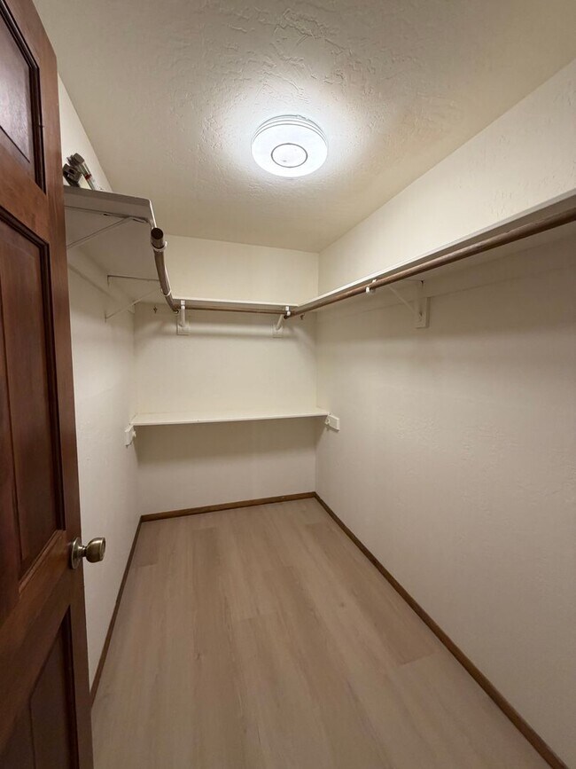 Building Photo - 2 Bed + Huge Bonus Room -  new flooring, paint and kitchen!   Lake Village Condo w/Forest Views