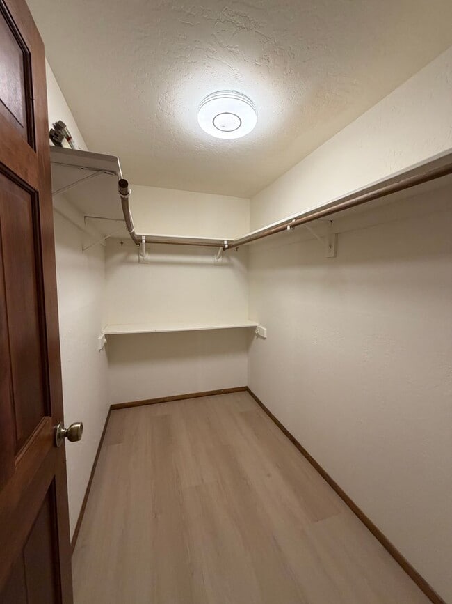 Building Photo - Tri-Level Lake Village Condo with Upgrades