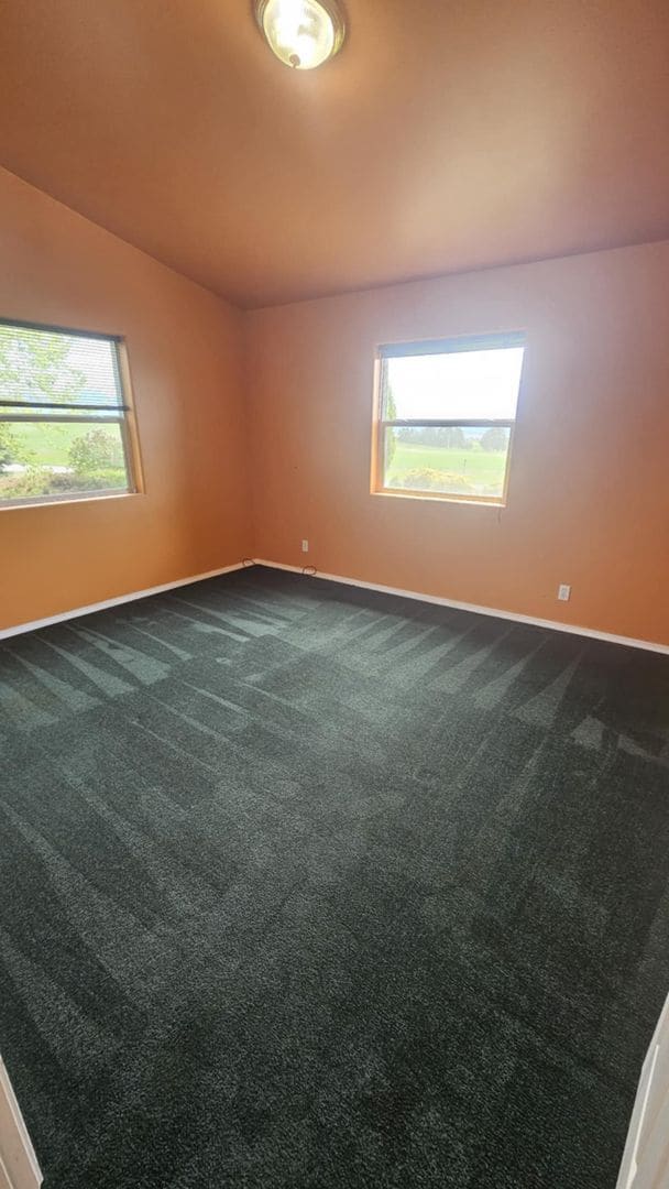 Building Photo - Out of town house with double garage and l...