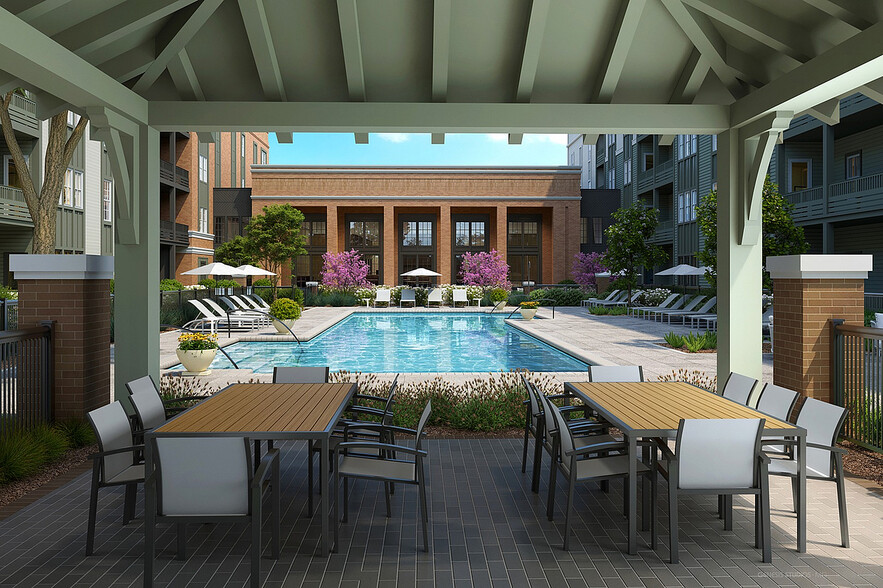 Relax and unwind in this elegant poolside oasis, perfect for entertaining and leisure. - The Filmont