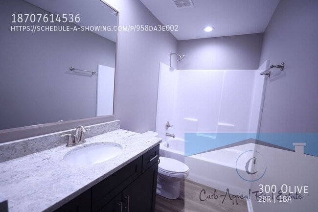 Building Photo - 300 Olive-