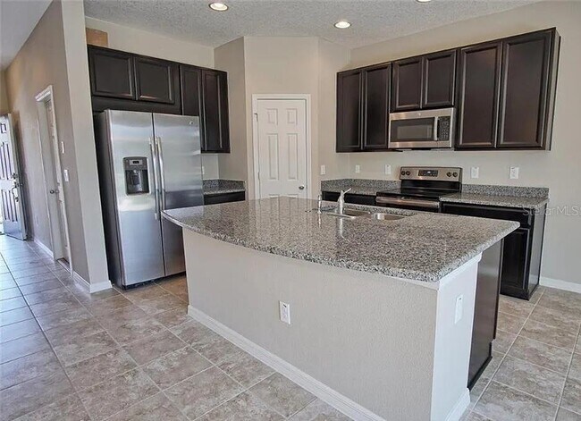 Building Photo - 7026 Woodchase Glen Dr